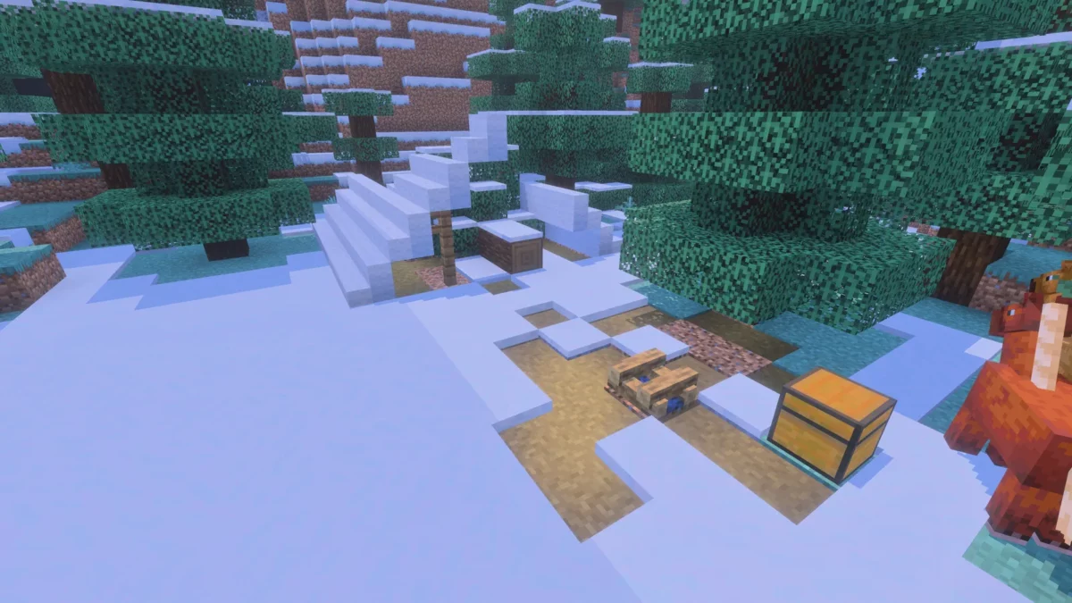 Camp abandonné enneigé dans une taïga dans Minecraft 26.3