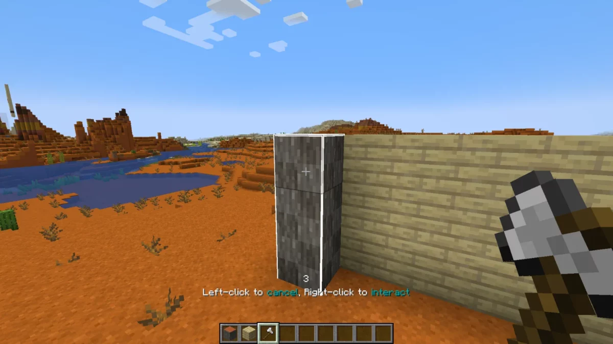 mod Minecraft Effortless Building outil en main écorçant toute une zone de rondins d'un clic