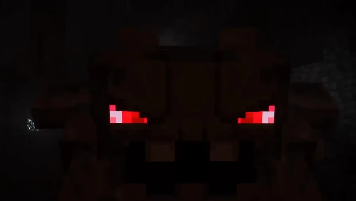 mod Minecraft Cobblemon 1.8 Grolem Alpha géant aux yeux rouges surgissant dans une grotte sombre