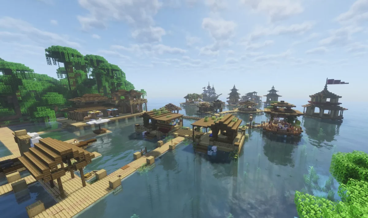 map Minecraft God Seed Build village sur pilotis réparti autour d’une vaste lagune tropicale
