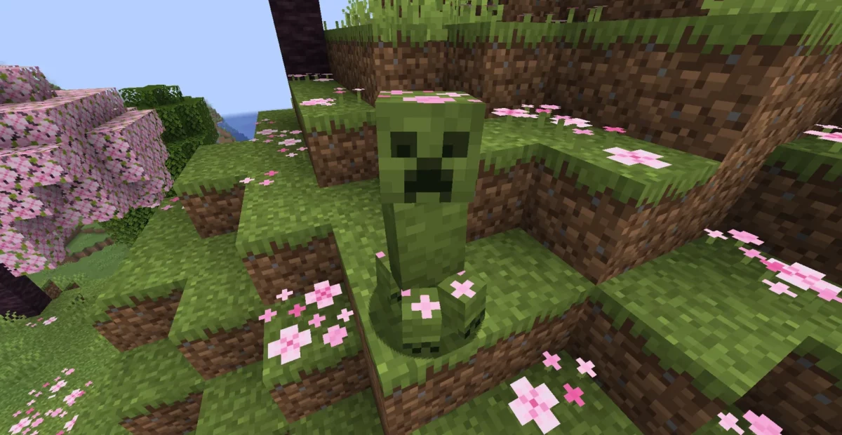 Creeper vert clair dans un bosquet de cerisiers Minecraft fleuri avec le pack d’AL