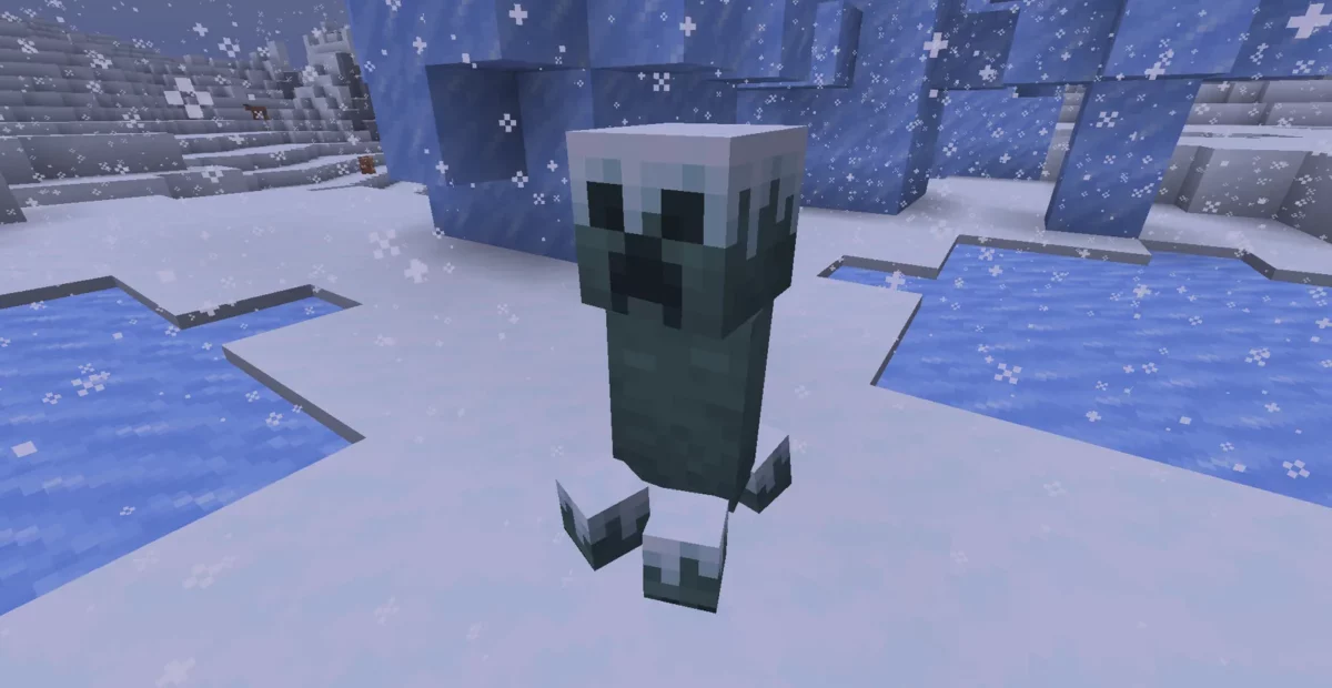 Creeper enneigé pendant une chute de neige dans Minecraft avec le pack d’AL