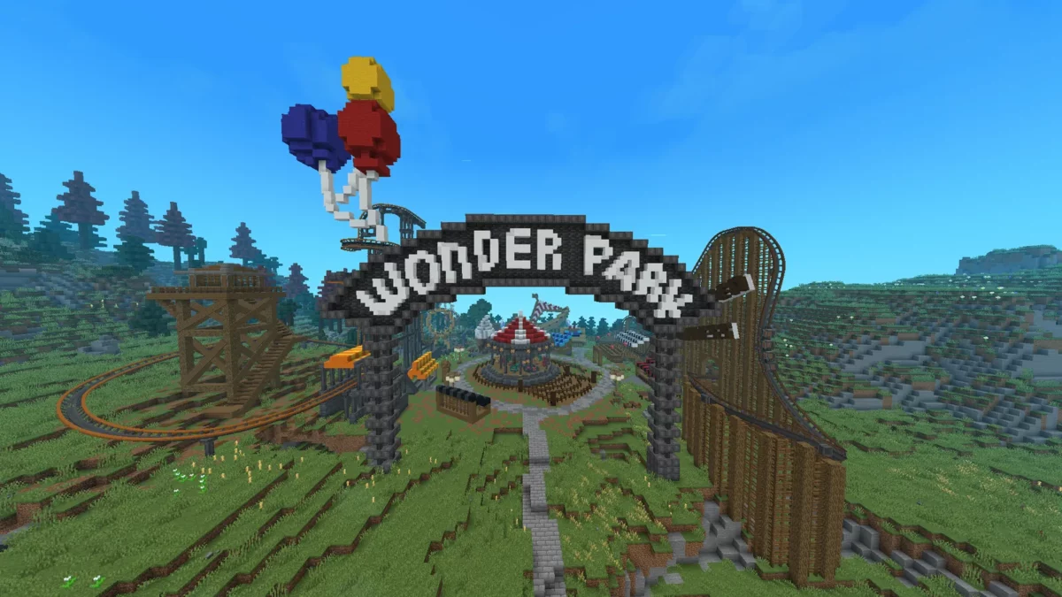 Grand parc d’attractions Minecraft rempli de montagnes russes construites avec Create Coasters Simulated