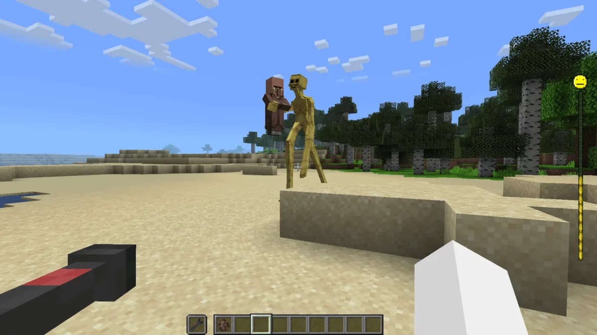 Le démon géant invoqué par Verity marche sur une plage dans Minecraft