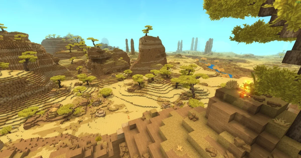 Ruines de pierre dans un paysage aride en terrasses créé avec WorldGen V2 de Hytale