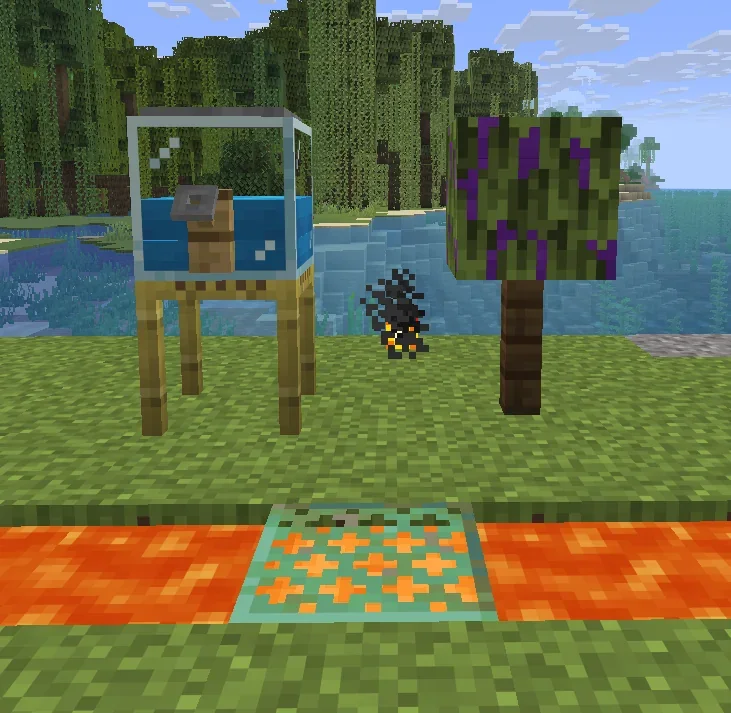 Aquarium, feu de camp et arbre décoratif construits avec des coussins dans Minecraft