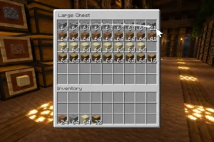 Mouse Tweaks est un mod qui accélère le rangement des inventaires dans Minecraft Inventaire Minecraft rangé rapidement par glissement avec le mod Mouse Tweaks dans un grand coffre