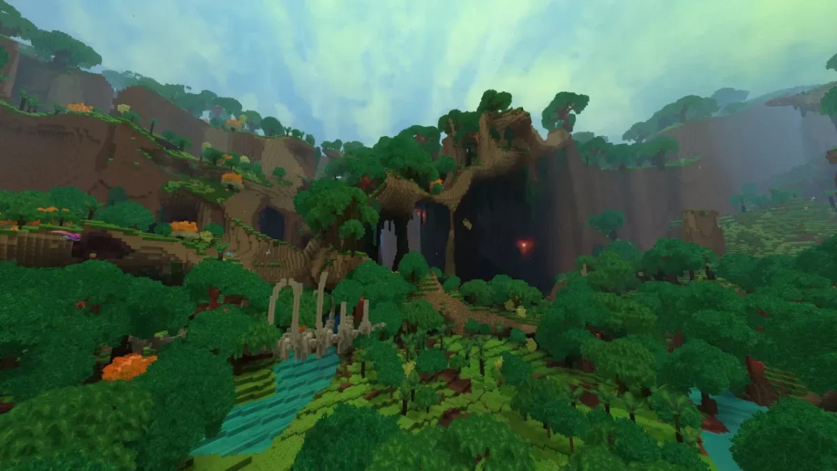 Vallée tropicale traversée par l'eau sous une arche rocheuse dans Hytale