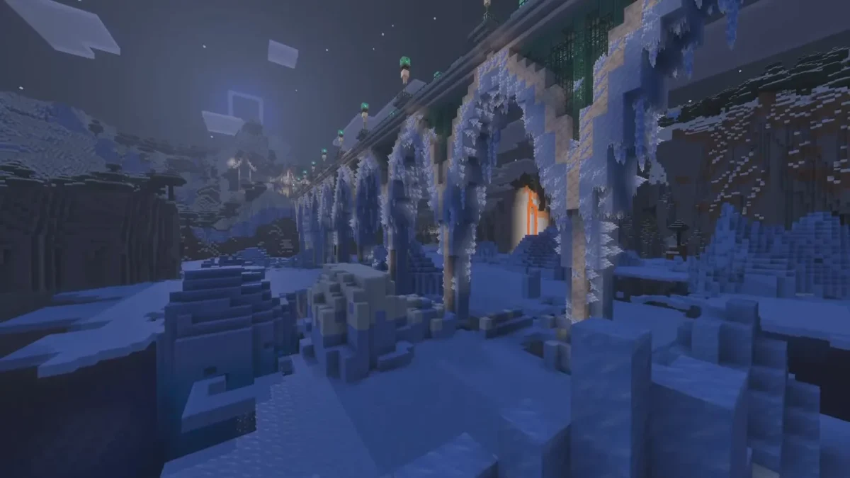 Un vaste passage souterrain gelé montre des colonnes de glace et de longues stalactites dans Minecraft