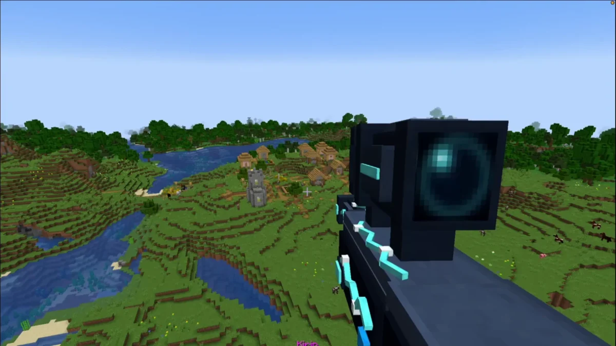 Fusil du mod Minecraft Kirin pointé vers un village depuis les airs