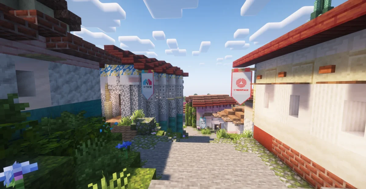 Rue de Minecraft avec la bannière de L’Hermitage, des toits rouges et des massifs de fleurs