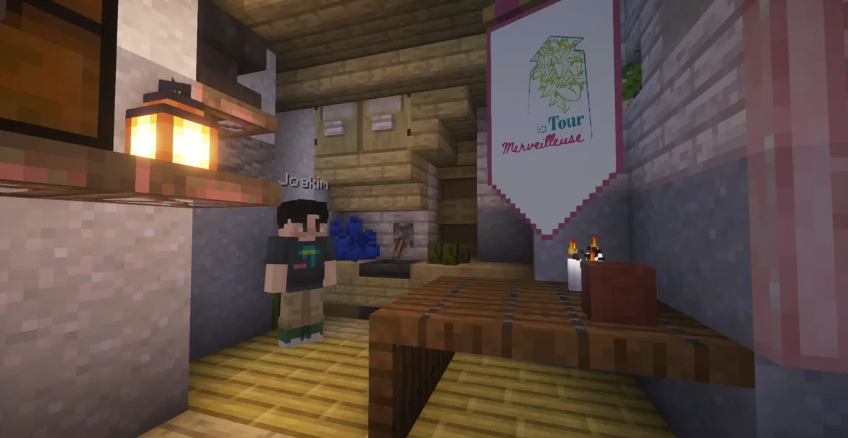 Le personnage de Joakim derrière un comptoir portant la bannière de La Tour Merveilleuse dans Minecraft