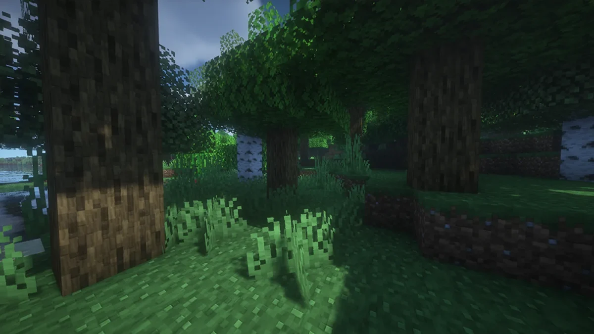 Troncs et feuillages Minecraft montrant des détails arrondis et une matière douce avec le pack Clayful