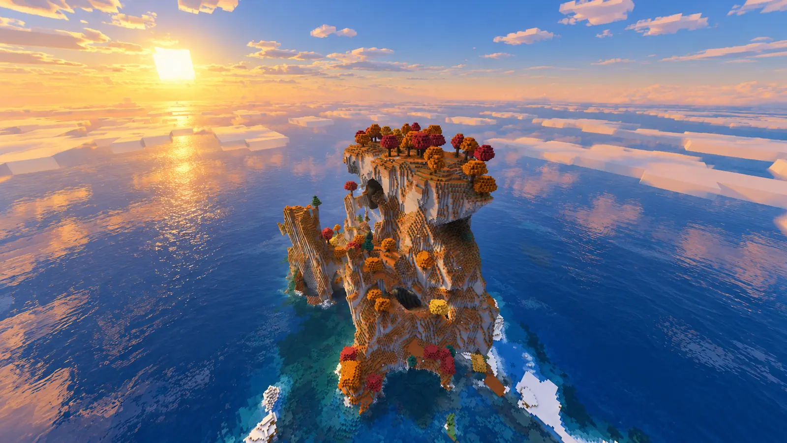 Île rocheuse verticale percée de grandes arches et coiffée d’arbres aux couleurs automnales au milieu de l’océan