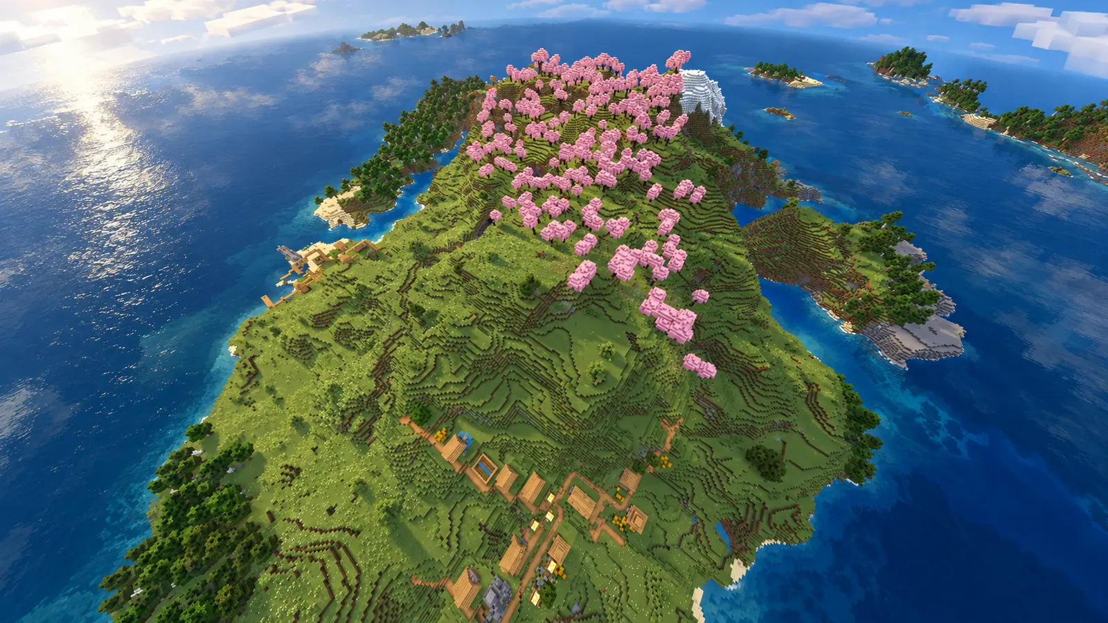 Grande île verdoyante portant une montagne de cerisiers roses et des villages sur ses pentes et son littoral