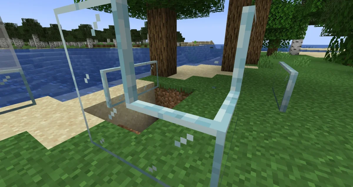 Vitres Minecraft reliées en angle près d’une rivière avec les textures connectées du pack de Midnighttigger